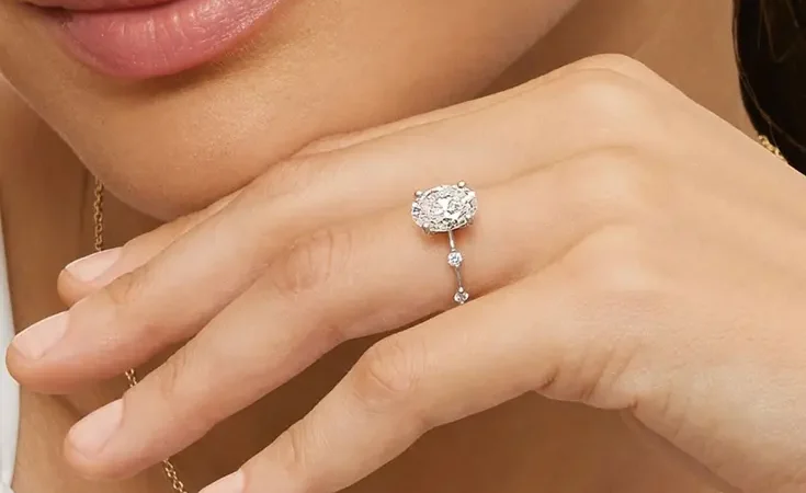 Cathedral-style oval engagement rings to adore